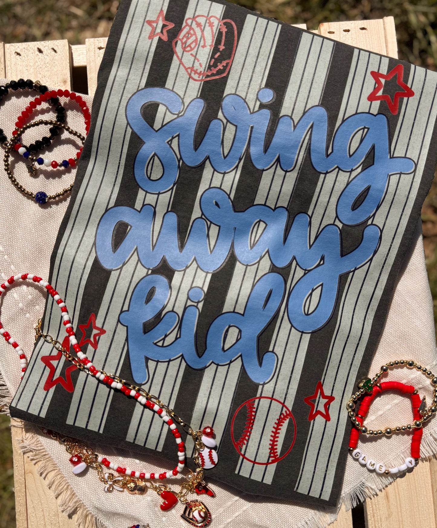 swing away kid tee